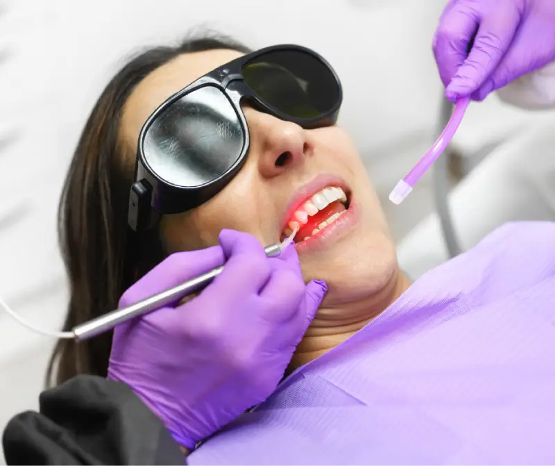 laser dentistry woman getting treatment laser laser dentistry woman getting treatment laser