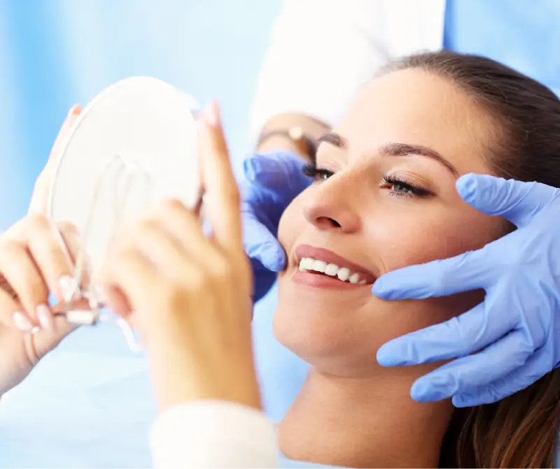 root canal therapy dentist with patient smiling up close root canal therapy dentist with patient smiling up close